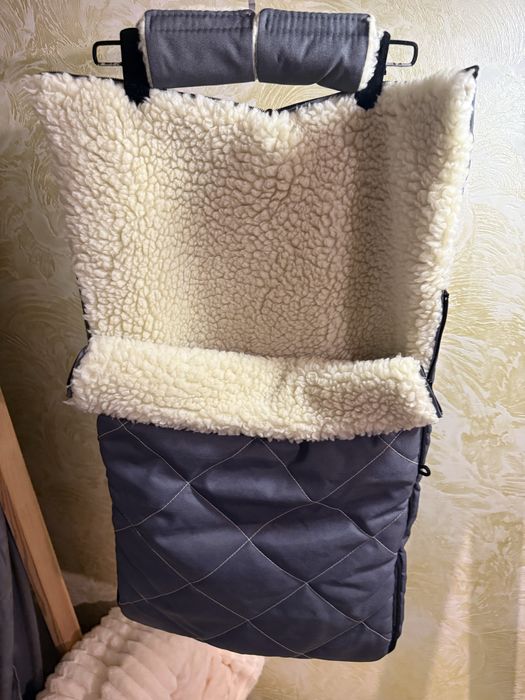 Продам конверт зимовий з накладками на ручку коляски.