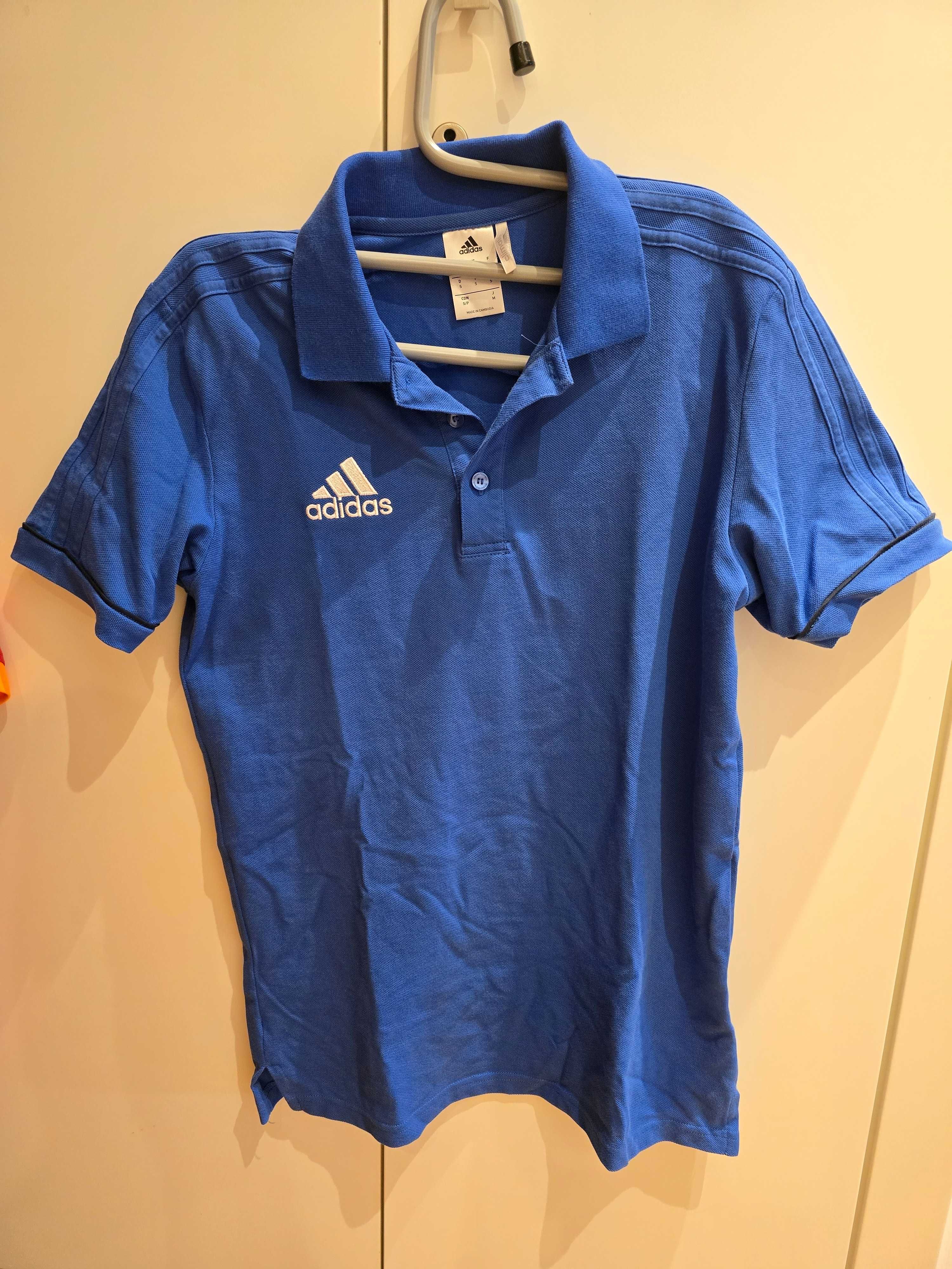 Polo Adidas, cor Azul, tamanho S, em bom estado.