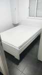 Cama de casal de madeira