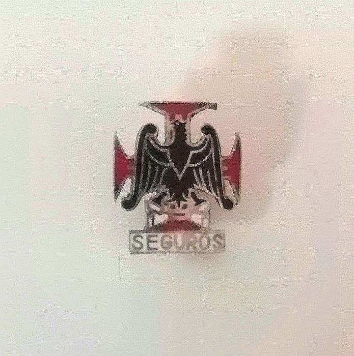 Antigo alfinete de lapela com símbolo da Companhia de Seguros Phoenix