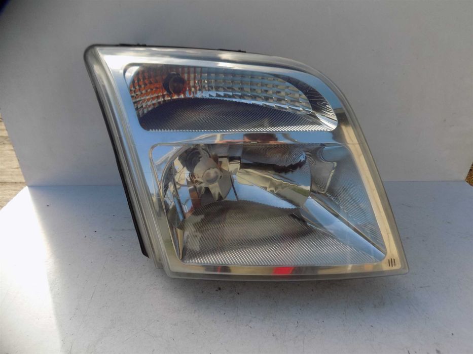 Reflektor lampa przód lewa Ford Transit Connect 02-13 Europa oryginał