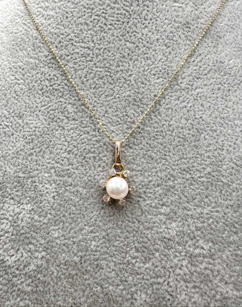 Złota zawieszka 750 z perłą i diamentami 0,30ct VS1-Si1/F
