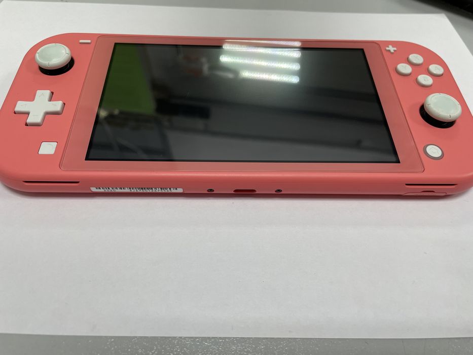 Ігрова приставка Nintendo Switch Lite (коралово-рожева) 32