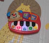 Gra zabawka edukacyjna z dźwiękiem i kolorem pianino Fischer Price