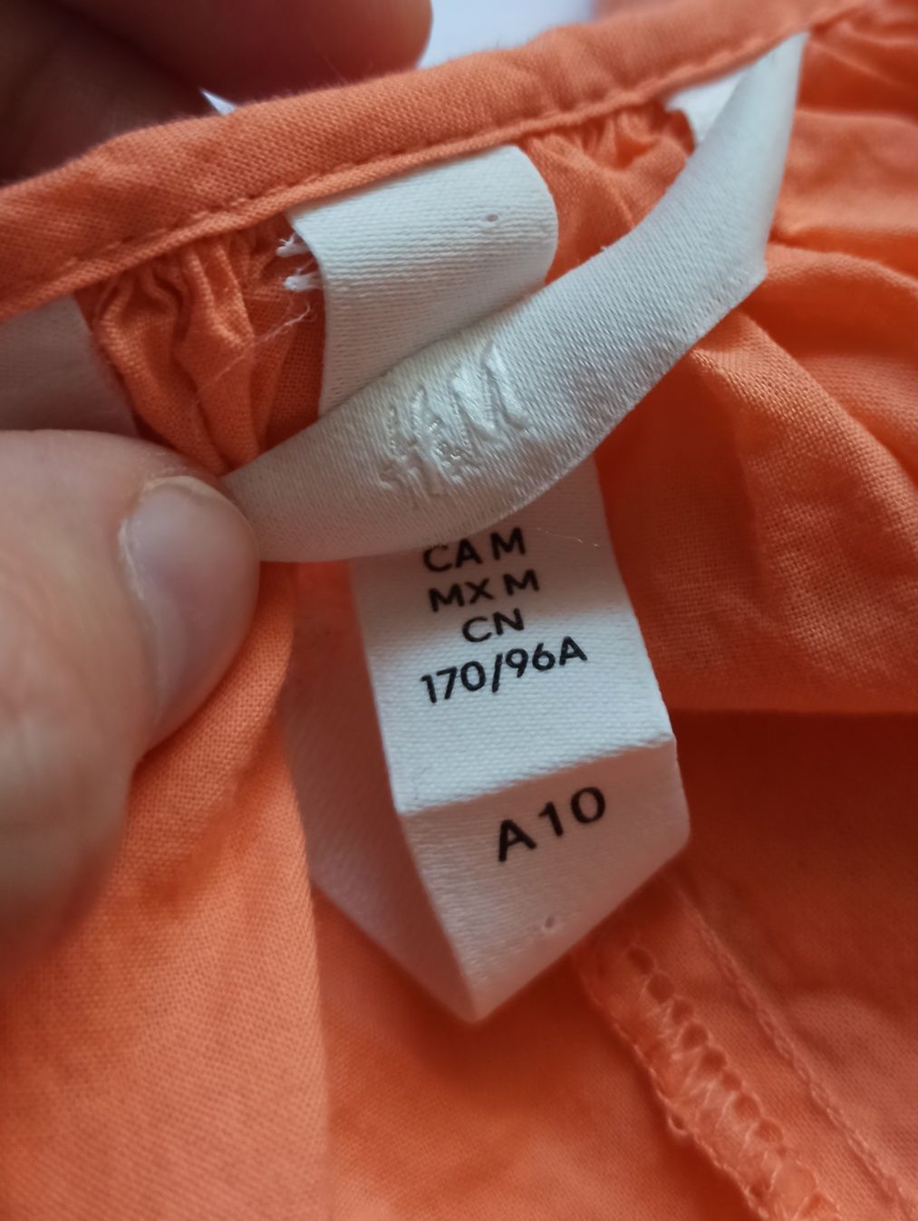 Pomaranczowa krótka lekka sukienka trapezowa z dekoltem w serek h&m 38