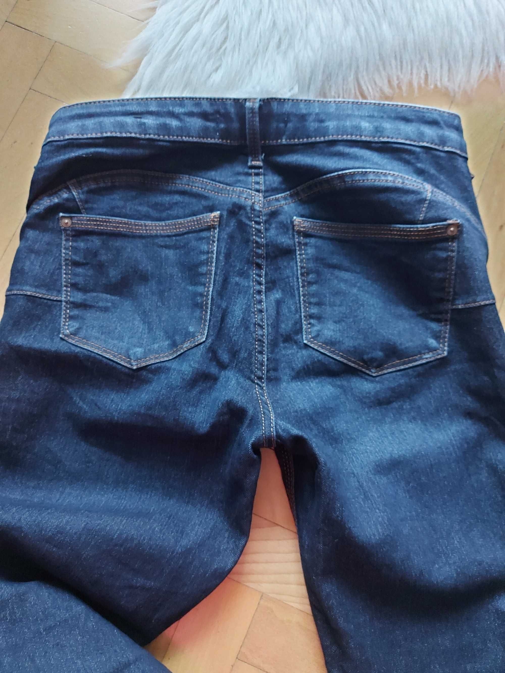 Spodnie jeans Mango