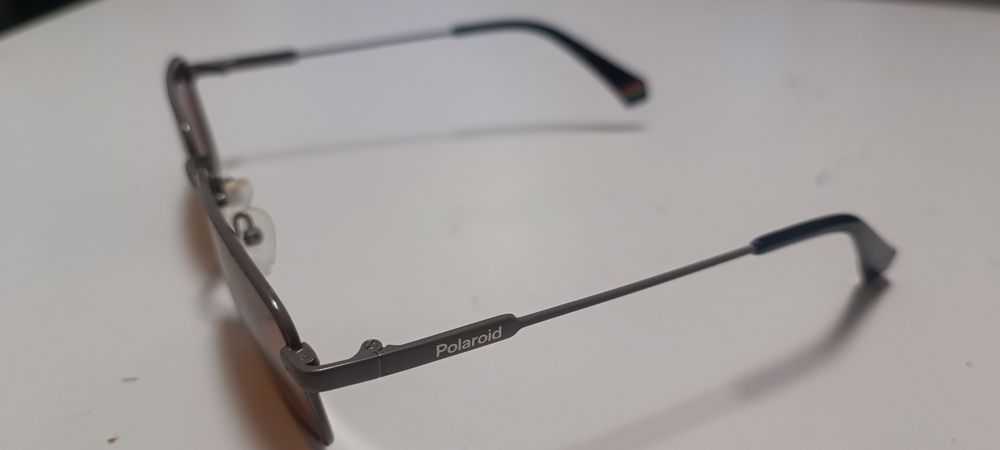 Óculos Polaroid e Web