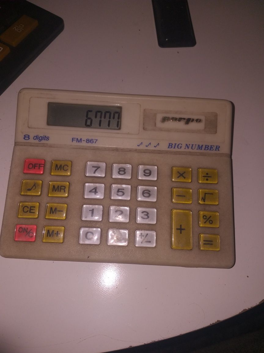 Trzy stare firmowe kalkulatory z okresu PRL