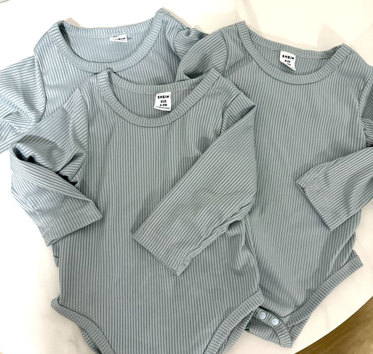 Bodies  6 a 9 meses. 93% Poliéster, 7% Elastane