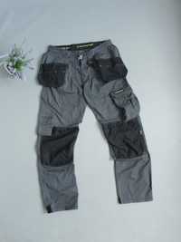 Dunlop робочі будівельні штани з навісними кишенями 30 s m cordura 46
