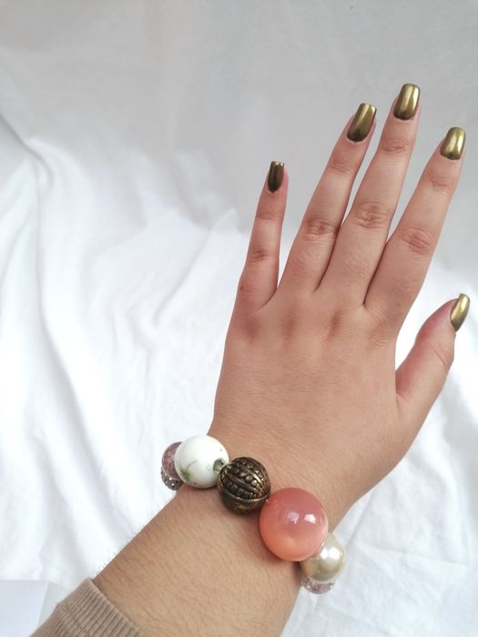 Pulseira com várias bolas