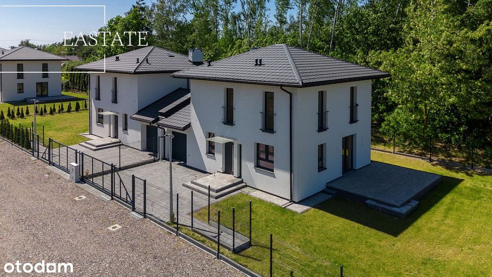 Bliźniaki połączone garażem z działką 500 m2