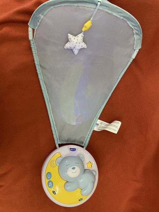 Іграшка проектор на ліжко chicco