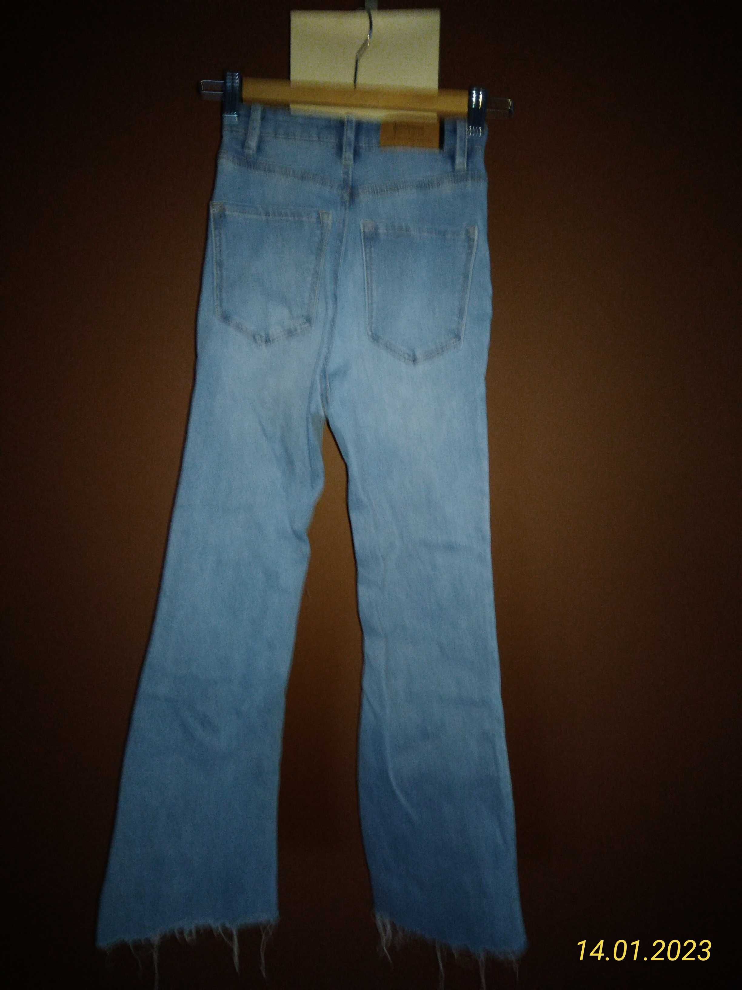 Spodnie Stradivarius 32 jeans dzwony