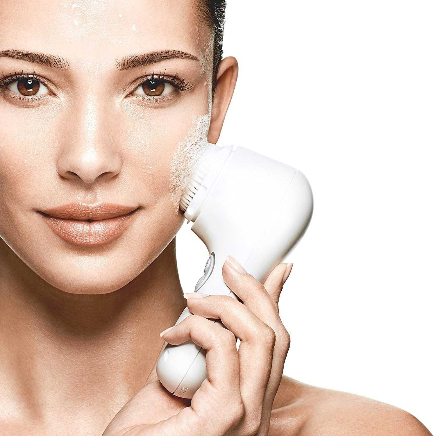 Szczoteczka soniczna do twarzy Clarisonic Mia 2 , miętowa z futerałem.