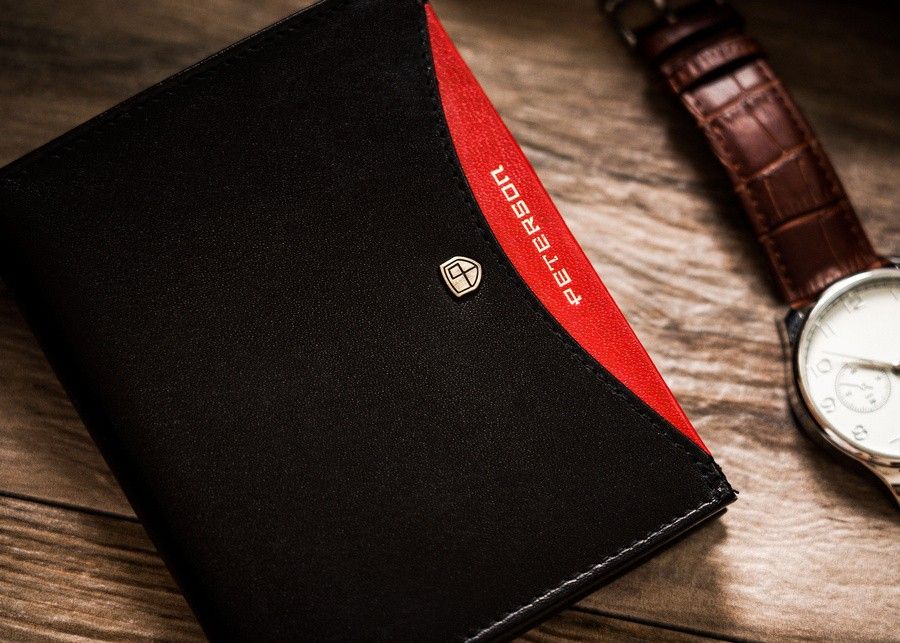 czarny, pionowy portfel męski ze skóry naturalnej - peterson