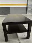 Mesa de centro preta usada