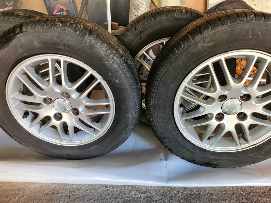 Felgi aluminiowe 15"'- Ford wraz z ..oponami Hankook