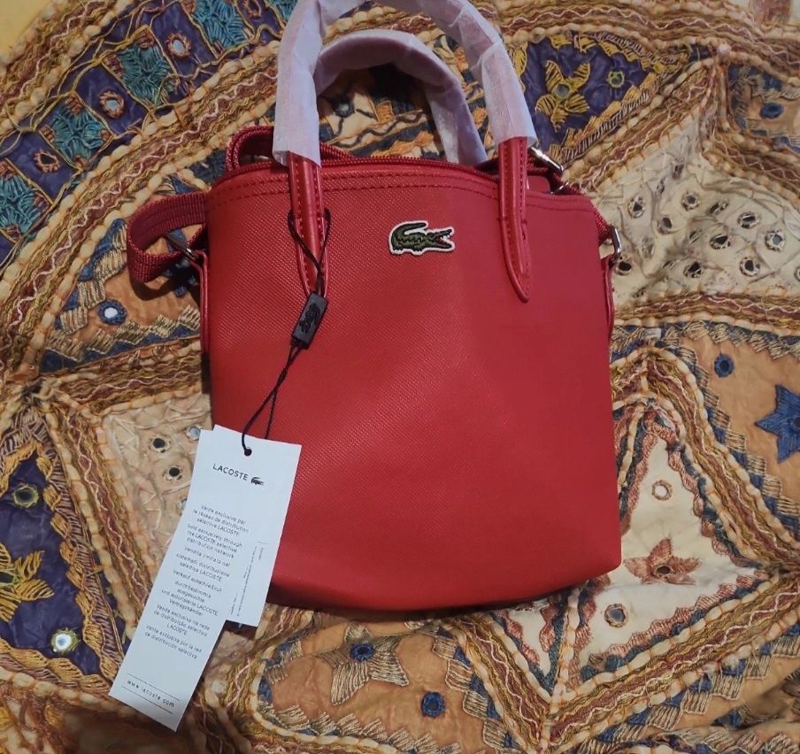 Bolsa nova lacoste com saco