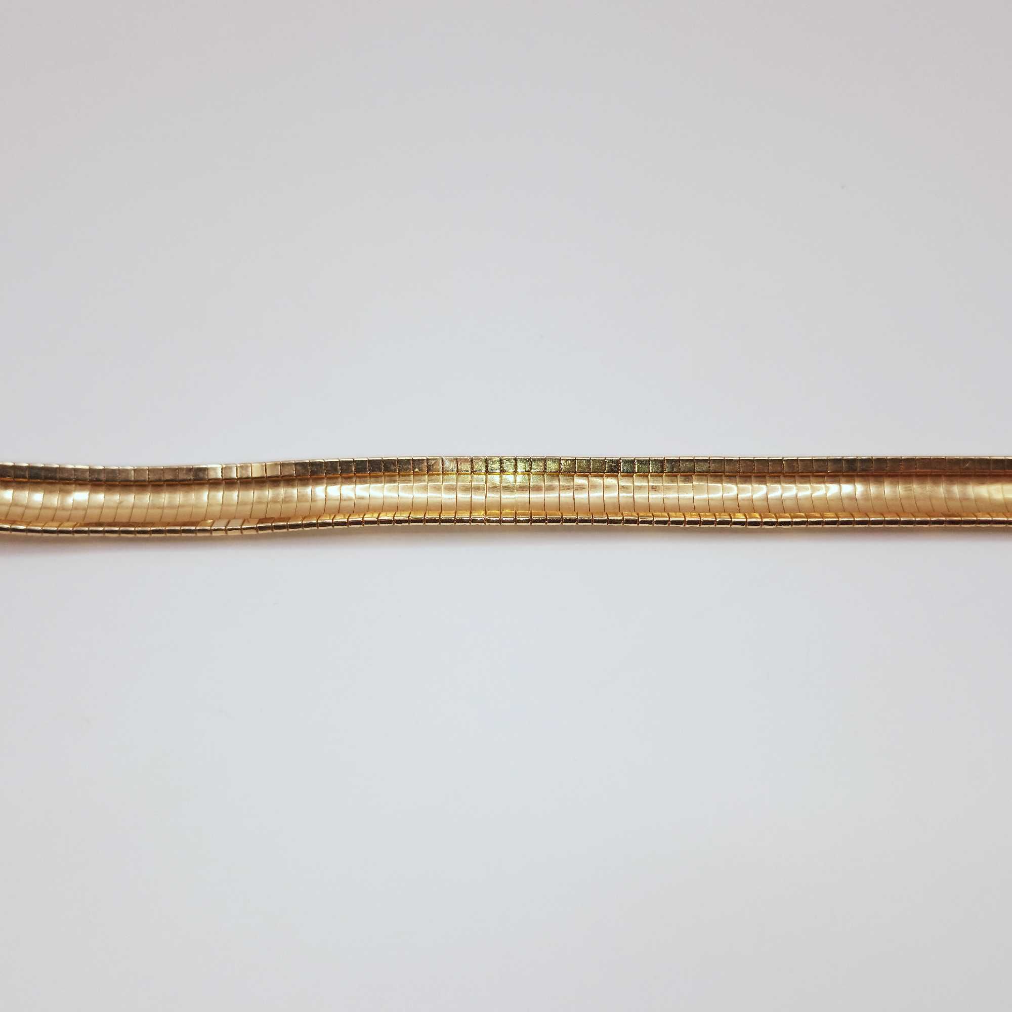 Złota bransoletka bangle z egipskim wzorem pr. 585, 26,25g. 19cm.
