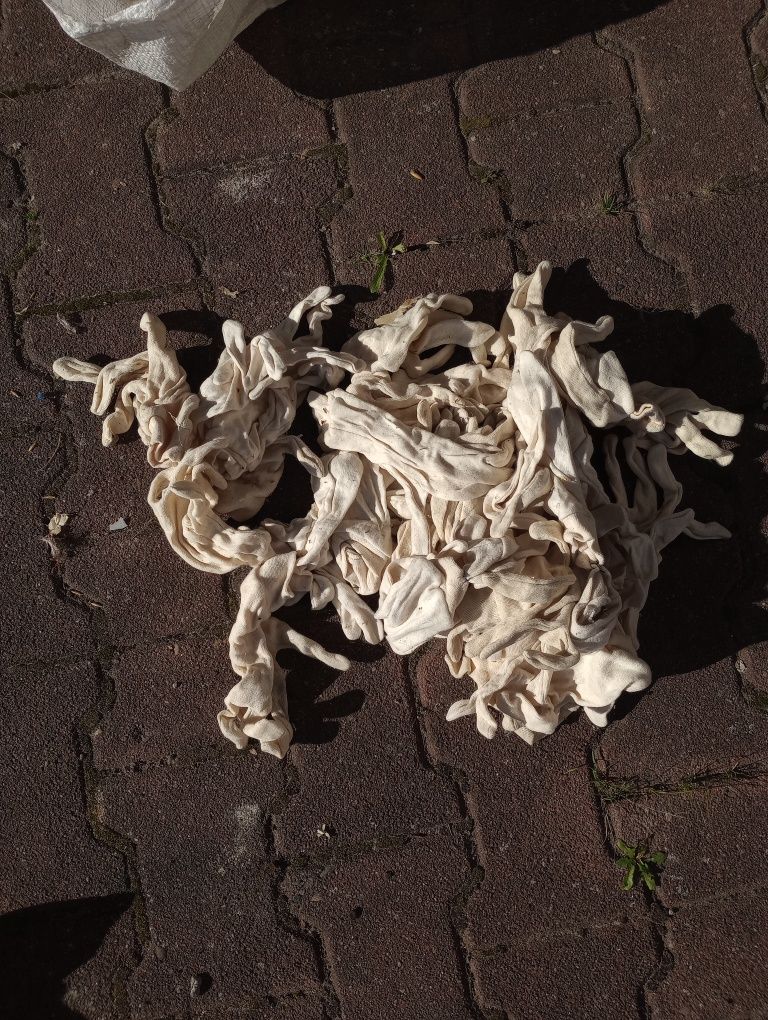 Worek XXL rękawic z materiału i skóry
