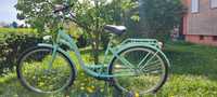 Zielony rower miejski damski