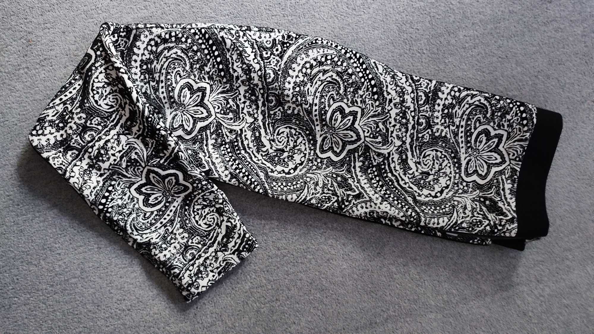 Spodnie legginsy damskie czarno białe wzorzyste w kwiaty Topshop