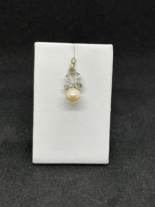 Złota zawieszka pr 583 1,12g z perłą