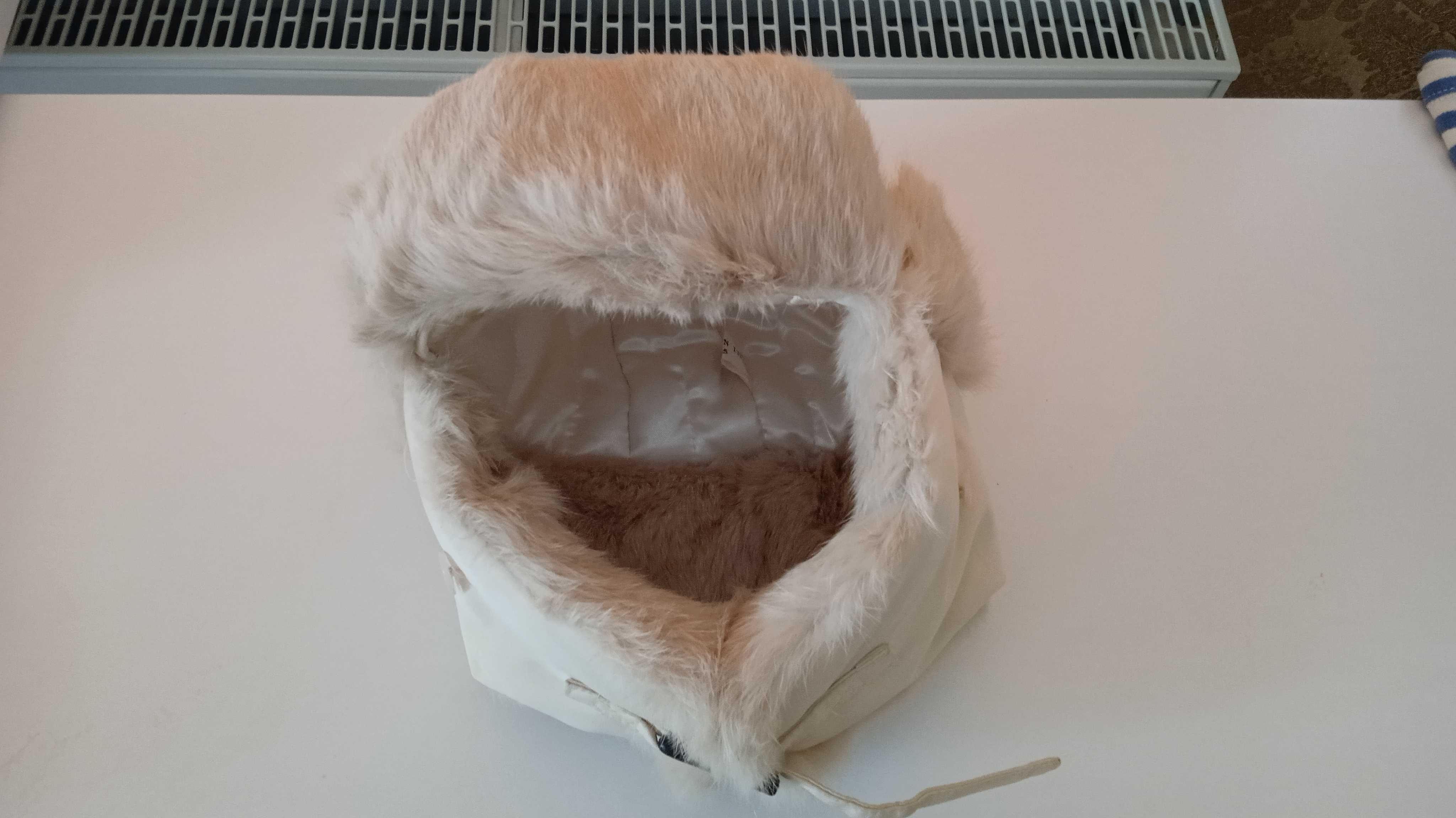 Продам теплую шапку