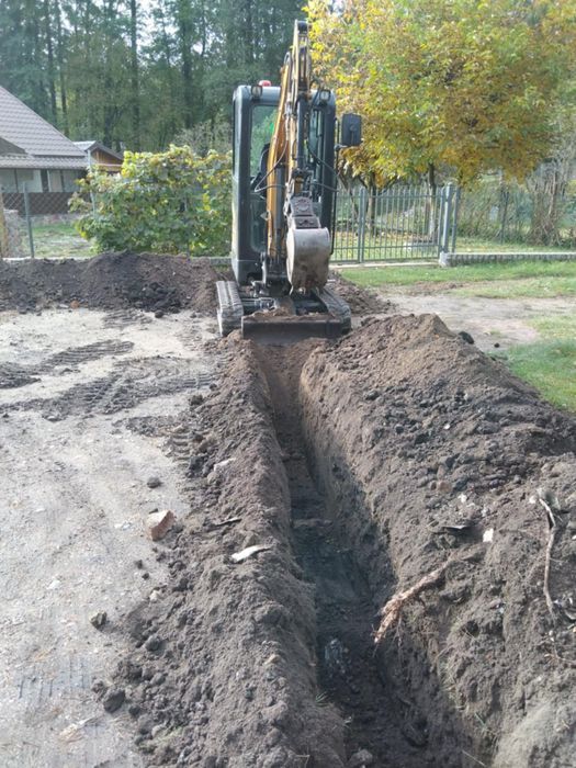 Usługi minikoparką, niwelacja koparka