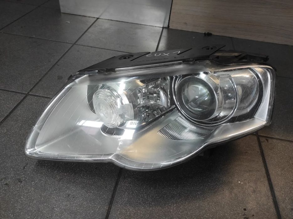 LAMPA PRZEDNIA LEWA VW PASSAT B6 .LUX1. PRZED LIFT BI XENON SKRĘTNY WYSYŁKA !!!
