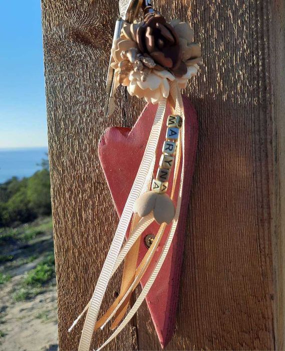 porta chaves ou um acessório para mala um presente lembrança