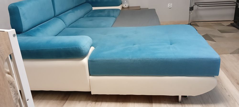 Kanapa rogówka z funkcją spania i pojemnikiem