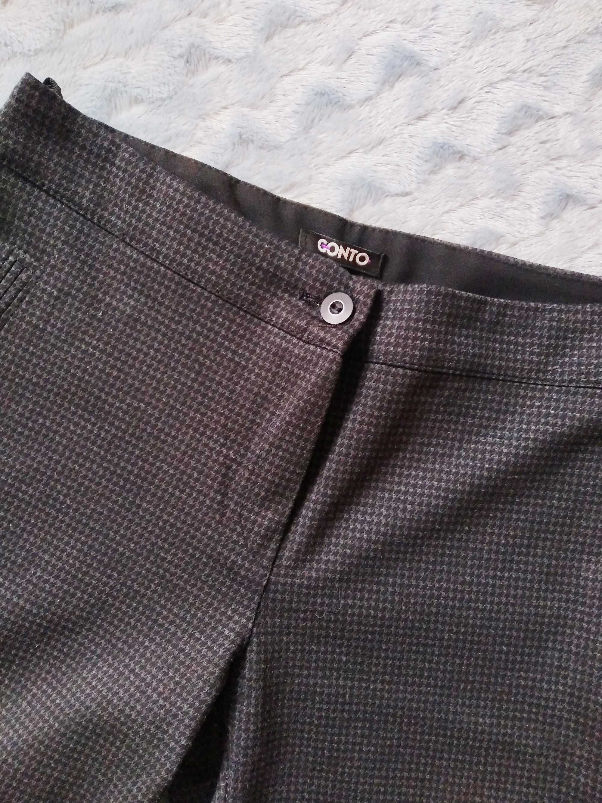 4. Spodnie czarne w pepitke r. 42