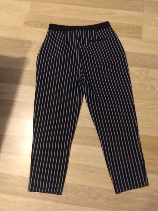 Spodnie damskie materiałowe w paski z klamrą L 40