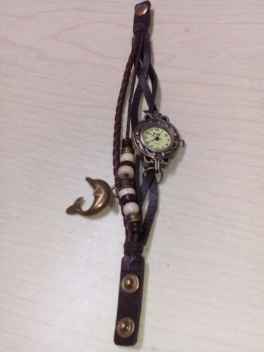 Relógio com Pulseiras.