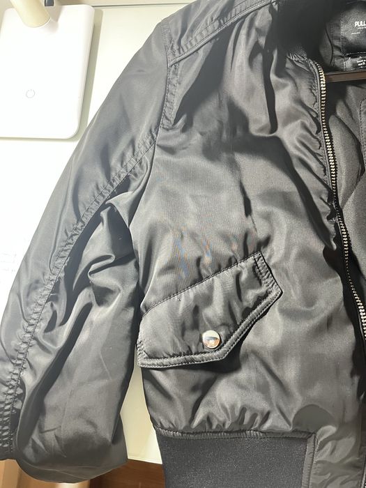 Casaco preto para chuva