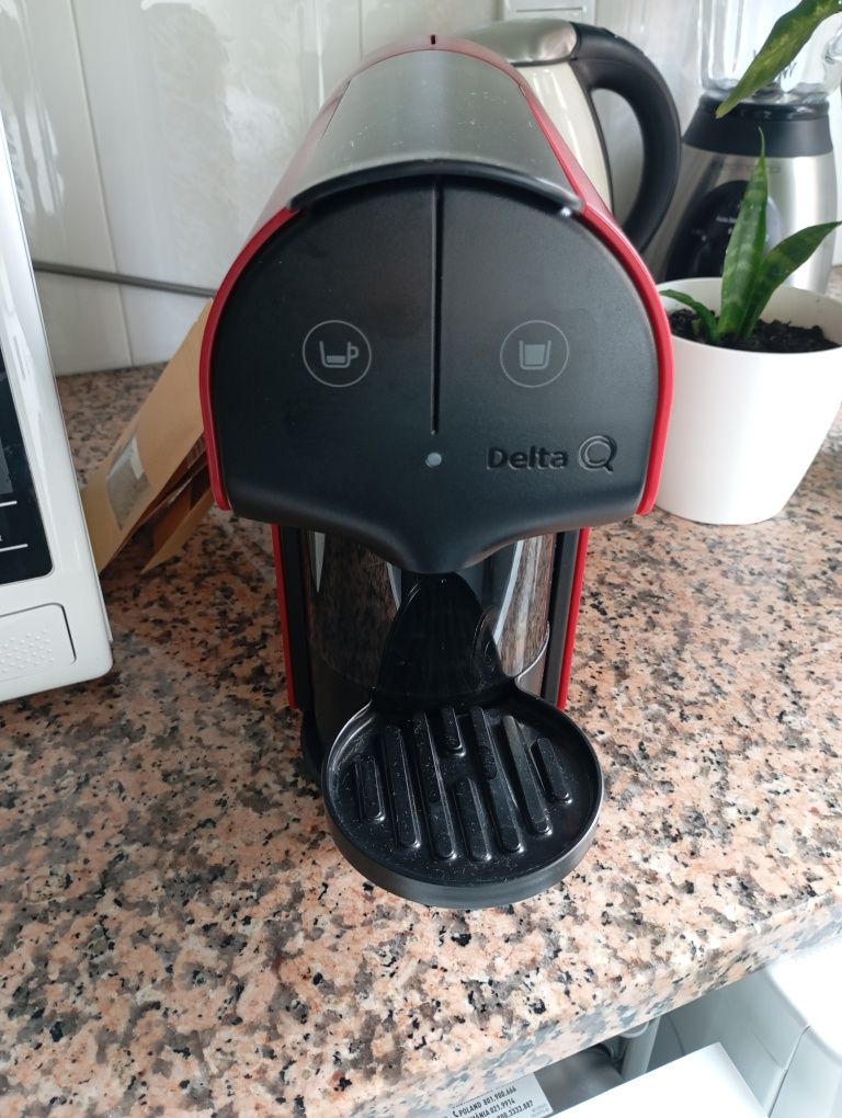 Máquina de café Delta.