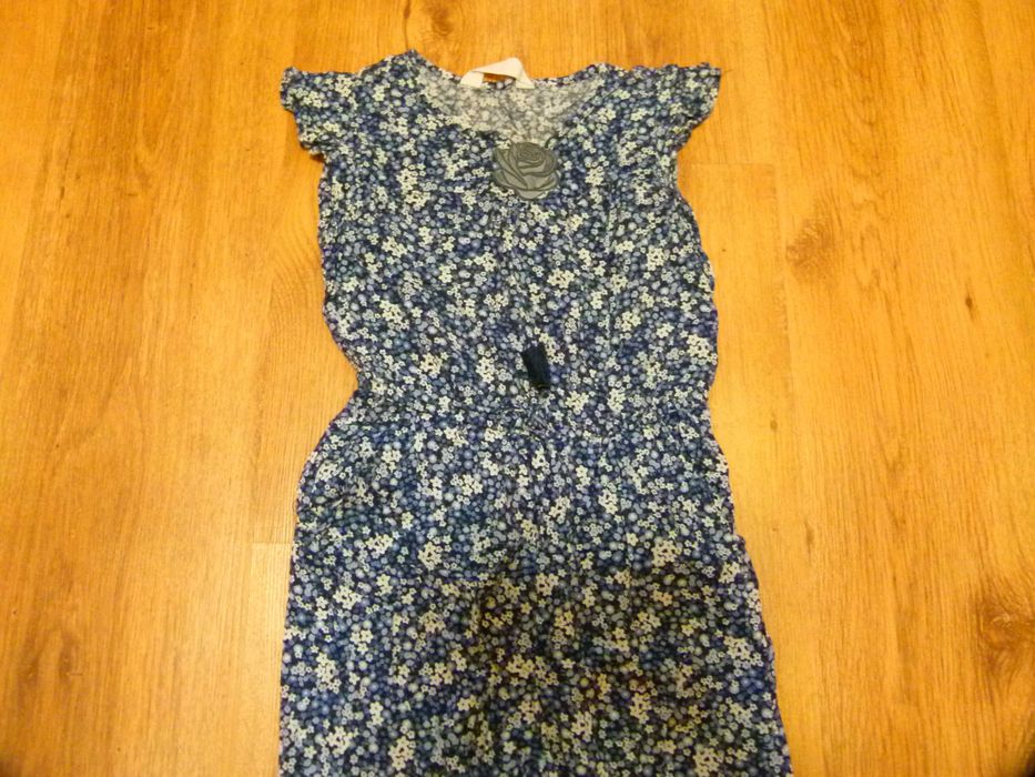 rozm 134 H&M kombinezon granatowy kwiatuszki długa nogawka