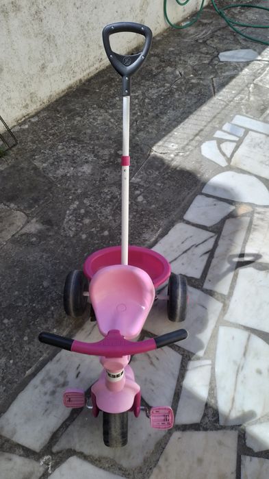 Triciclo cor de rosa