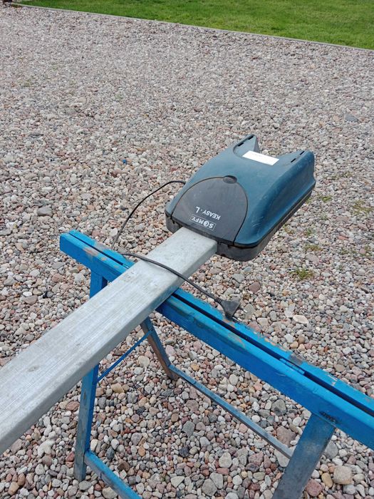 Mechanizm podnoszenia drzwi garażowych