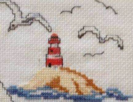 2 quadros em ponto de cruz com molduras