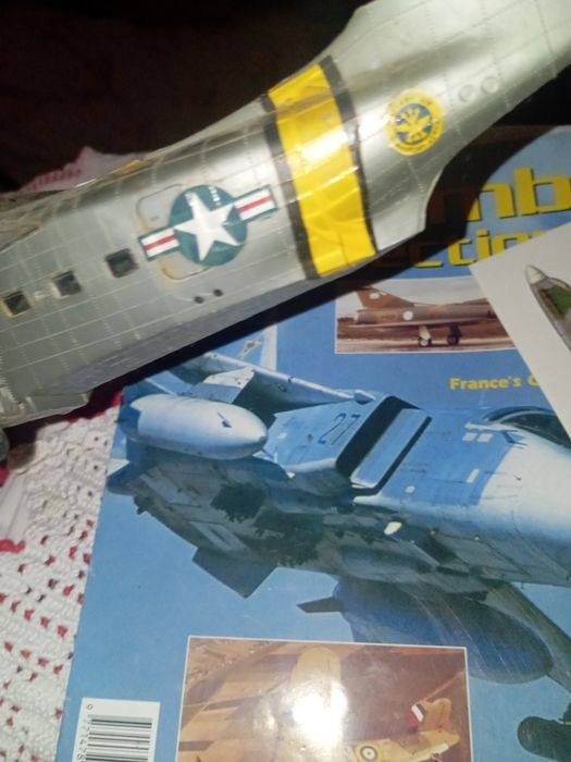Revista avião e postal da Parker