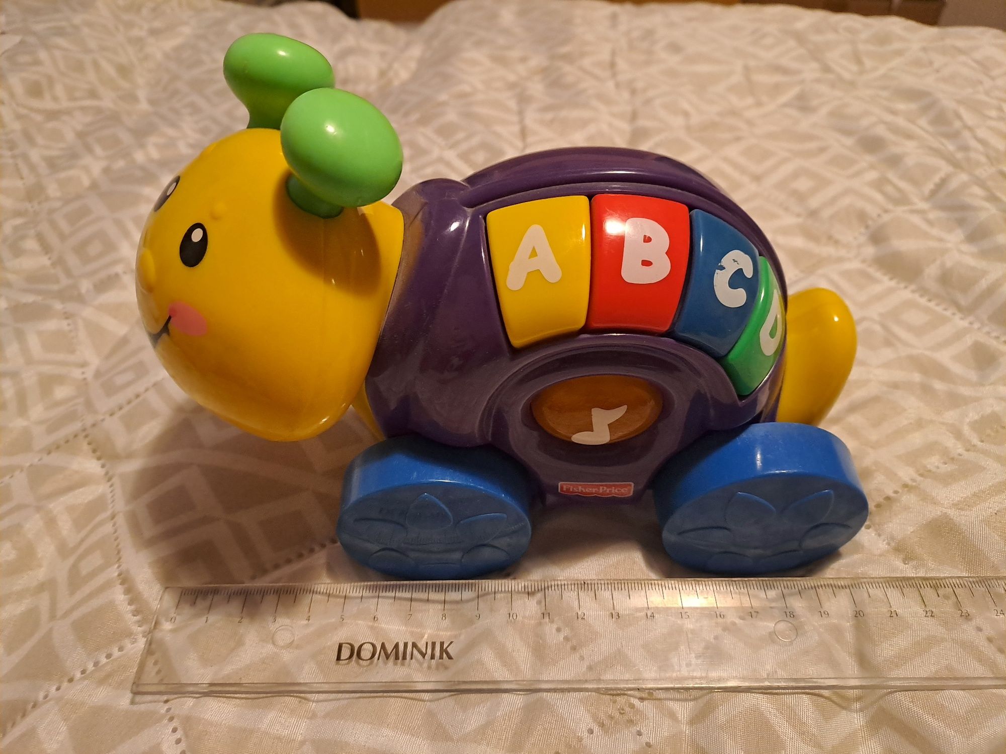 Ślimak fisher price interaktywna Zabawka grajaca