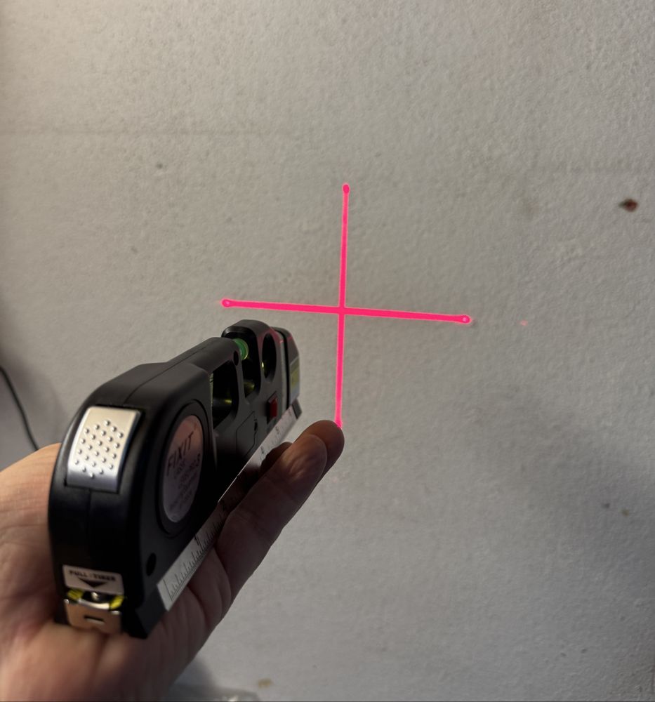 Nivel laser com fita metrica