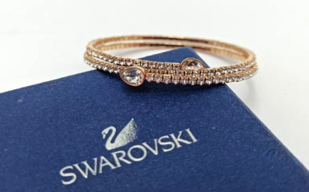 BRANSOLETKA SWAROVSKI kolor złoty z cyrkoniami