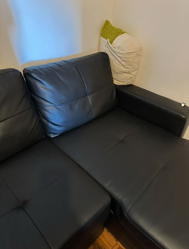 Sofa em pele com opcao de cama