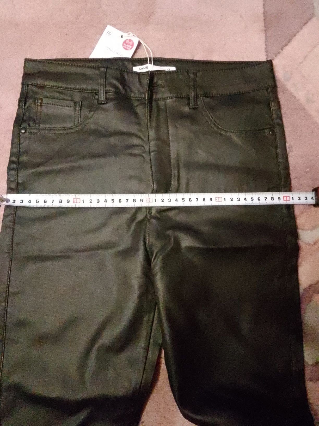 Woskowane czarne spodnie nowe Sinsay rozm XL/L