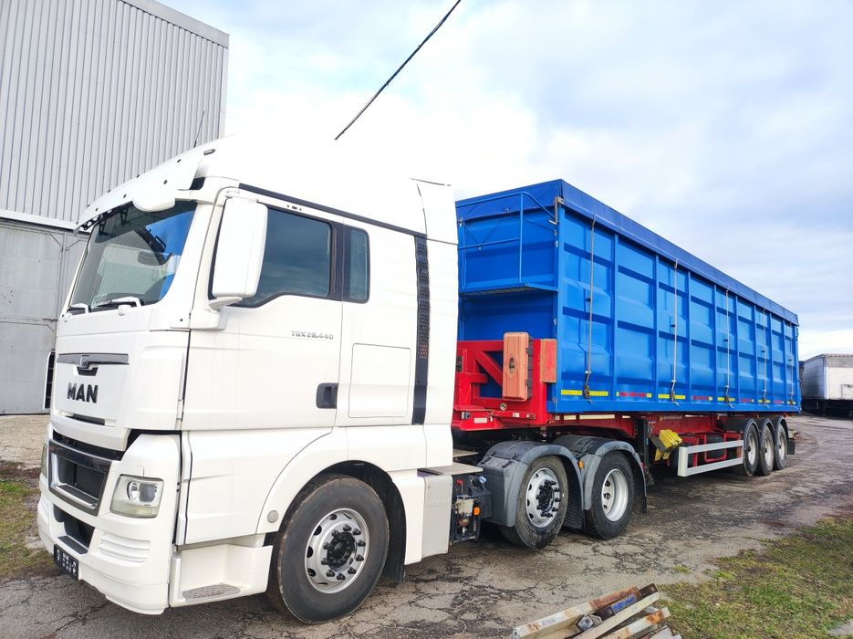 Самоскид контейнеровоз зерновоз заводський полуприцеп 68 кубів