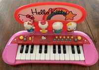 Piano elétrico para criança com figuras da Hello Kitty